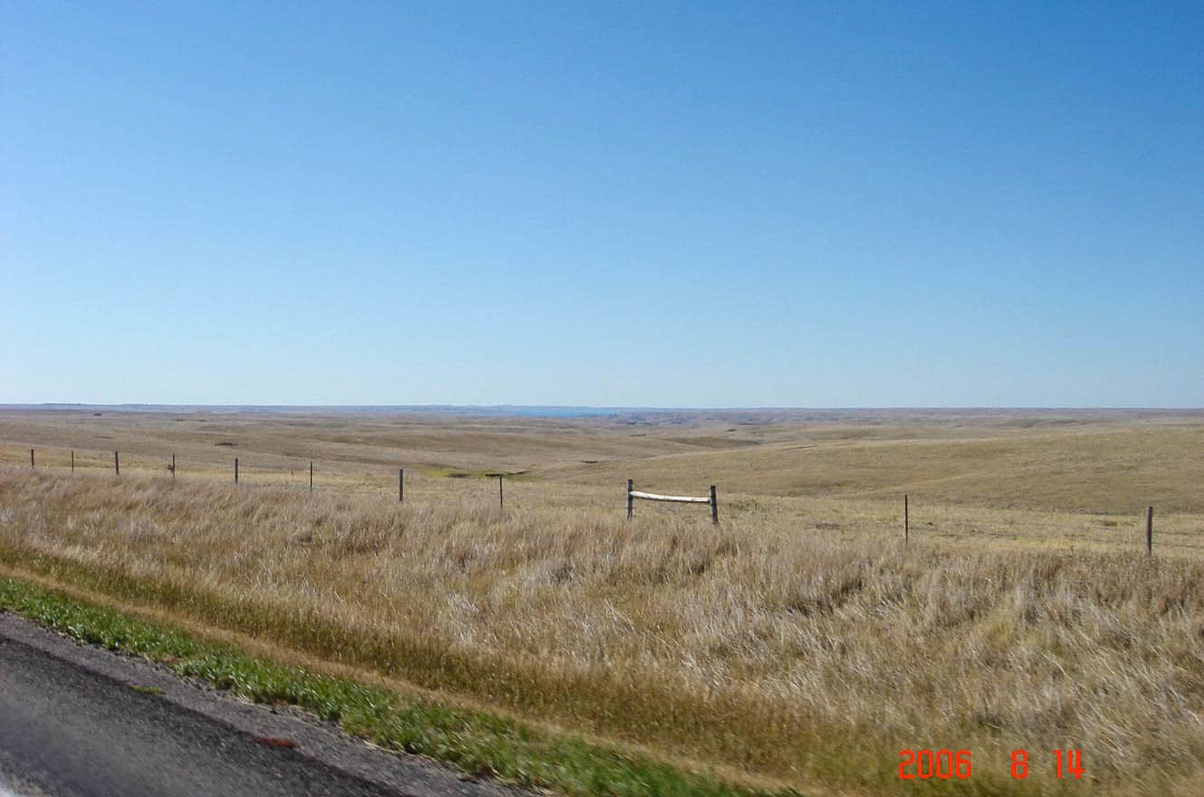 Open grassland along the highway leaving the Badlands