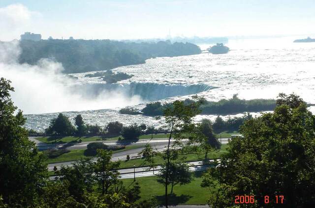 A restaurant and crosswalk near Niagara Falls where the motorcycle was parked