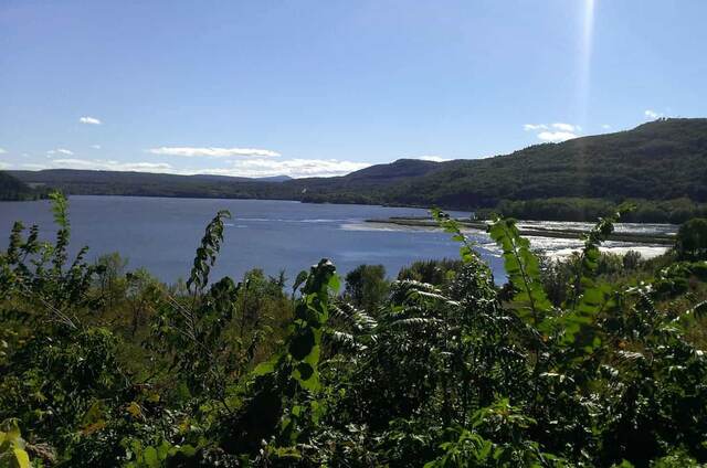 A tranquil view of Lake Champlain and the surrounding forested hills from Fort Ticonderoga