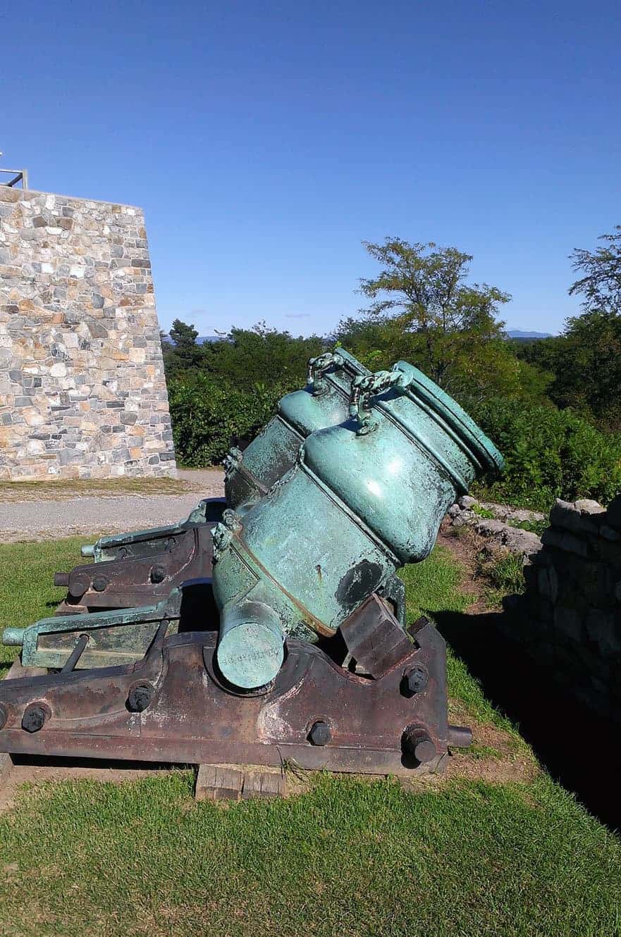 An 18th-century bronze mortar mounted on its carriage on the fort's grounds