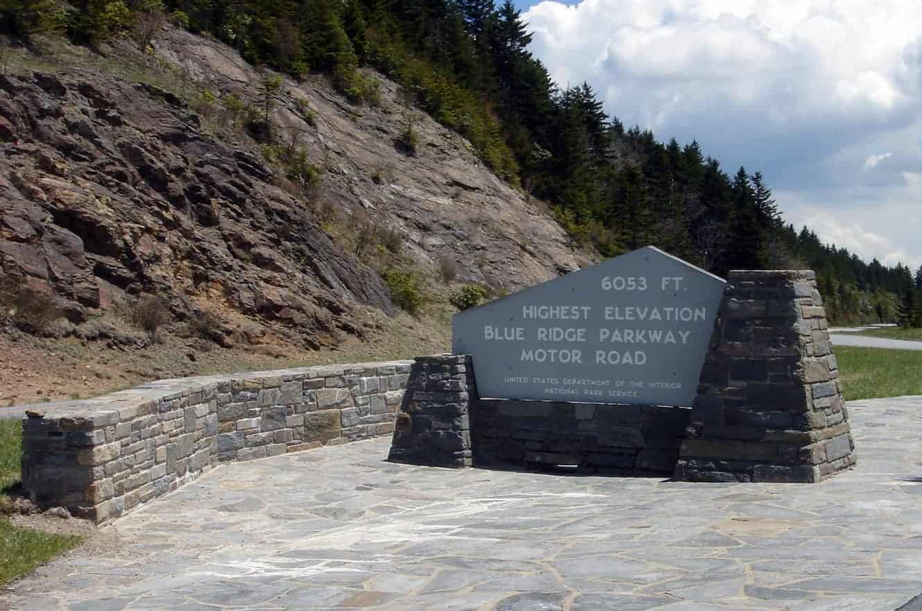 A stone marker at the highest point of the Blue Ridge Parkway Motor Road, elevation 6,053 feet