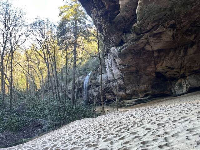 Looking at the waterfall from inside the entrance of the sand cave