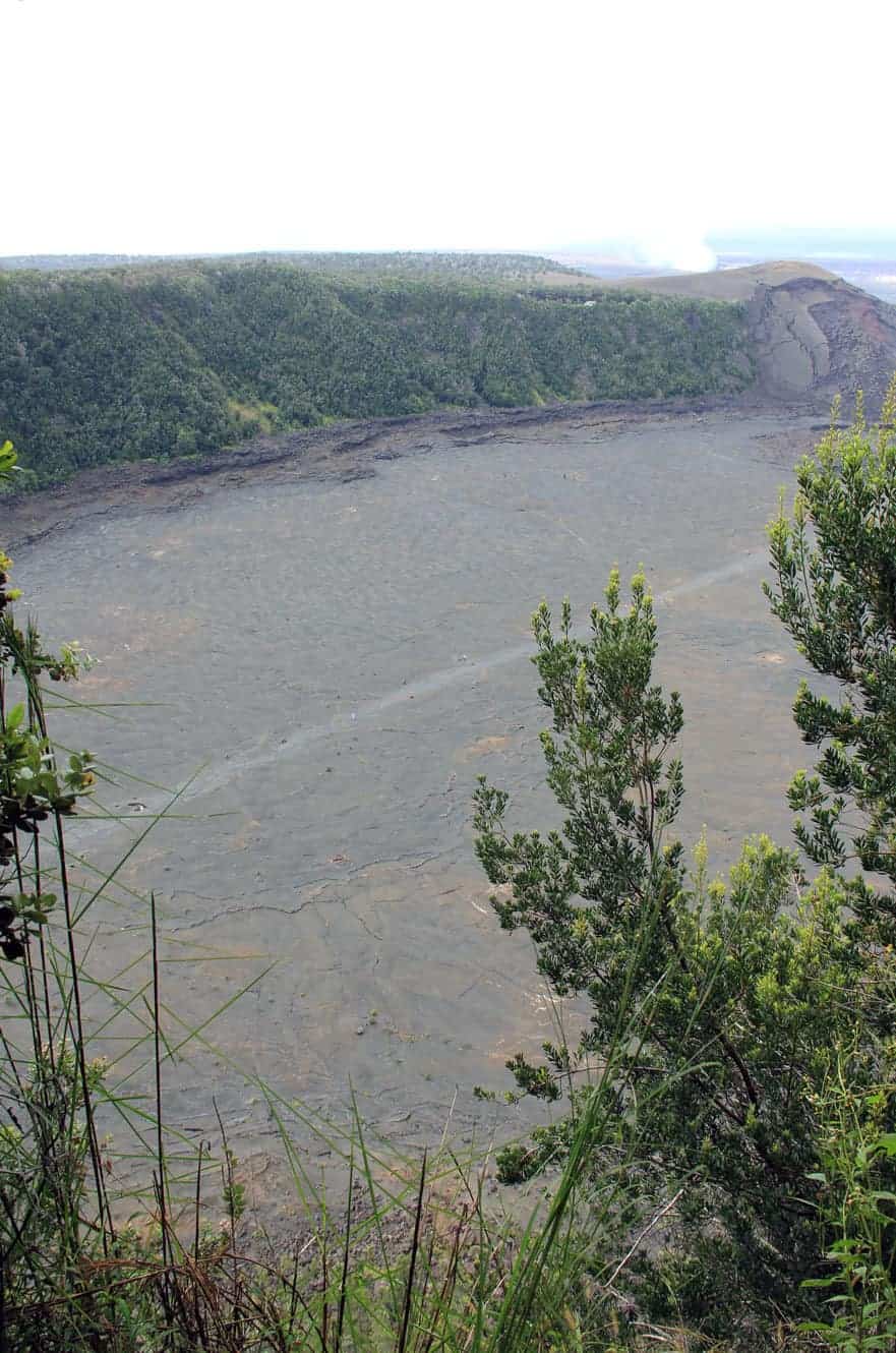 View across the Kilauea Iki crater floor with steam rising near the far rim