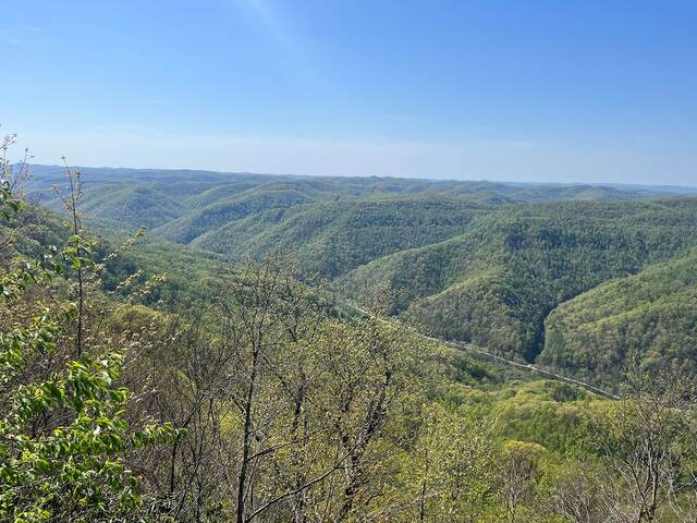 Green mountain ridges and a valley road seen from Kingdom Come State Park